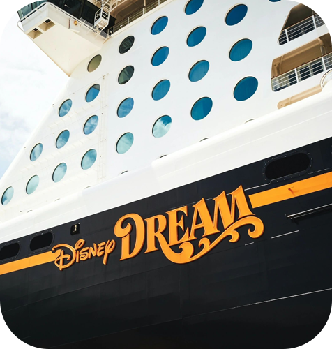 A cruise ship with the words " disney dream ".