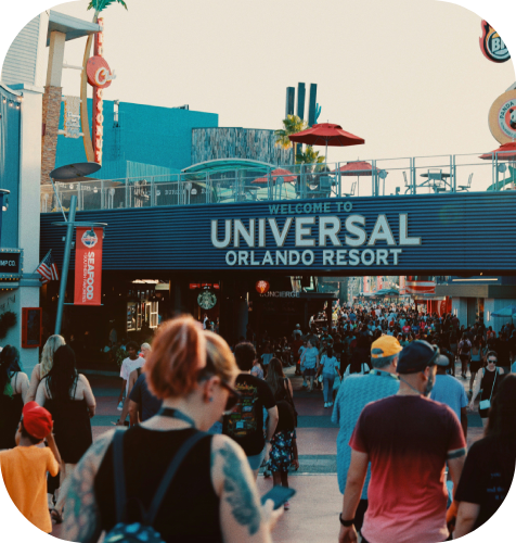 A crowd of people walking down the street.